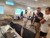 Instructor teaching student about virtual reality during Saturday STEAMlab in Savannah.