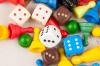 Colorful board game pieces and dice