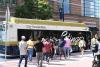 This image shows the campus community waiting to get onto the Stinger Gold Route bus.