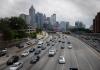 Traffic flows in and out of downtown Atlanta on the I-75/I-85 Connector Thursday, May 19, 2016, in Atlanta. (AP Photo/John Bazemore)