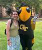 Angela Juric with Georgia Tech mascot Buzz