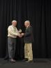 Rusty Roberts (r.) accepts  the International Test and Evaluation Association's (ITEA) 2025 Allen R. Matthews Award.