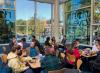 Students in the Grand Challenges program meet with administrators and faculty for lunch in the North Avenue Dining Hall