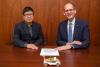 Speed Wireless CEO Thomas Chen and School of ECE Chair Steve McLaughlin.
