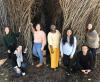 Group photo of the first class of BBISS GRA Scholars in front of the EcoCommons Patrick Dougherty Sculpture installation. They are Katherine Duchesneau, Ioanna Maria Spyrou, Meaghan McSorley, Bettina Arkhurst, Udita Ringania, Yilun 'Elon' Zha, and Marjorie Hall.