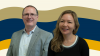 headshots of Danny Hughes and Aselia Urmanbetova on a ribbon background of gold, orange, navy blue, and cream