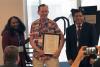 John Crittenden receiving an ACS Honor Award. L to R: Sherine Obare, John Crittenden, Sharma Virender