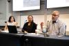 Shatakshee Dhongde, Lauren Johnson, and Jonathan Gayles speak on a panel at the 10th Diversity Symposium. 