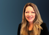 Whitney Buser's headshot in a navy blue gradient background