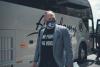 Football Coach Geoff Collins sport a face covering.