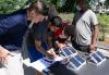 Students of the 2021 "Energy Unplugged" summer STEAM camp recording data from a small solar test kit.