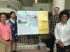 2017 winning Carbon Reduction Challenge team with their poster presentation.