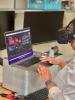Kala Jordan-research engineer II-using a VR/AR headset.