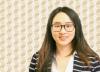 Image of Jie Chen on a gold patterned background