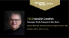 TECHnically Creative: Georgia Tech Alumni & the Arts with Michael Boatright, ICS 1982. , A man, directly facing the camera, his face closeup. He is wearing a black shirt, black rimmed glasses, and smiling.