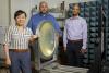 (L to R) Ellen Yi Chen Mazumdar, Aaron Stebner, and Anirban Mazumdar, PIs for Georgia Tech's recently awarded UCAH grants, stand next to a free-space focused beam characterization system for studying radome materials that can be used for hypersonics. Not pictured: Jonathan Rogers. (Photo credit: Sam McNeil, GTRI)
