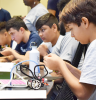Young stundent exploring Robotics and Programming