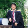 HSOC Ph.D. student Jack Linzhou Zing in graduation robes 
