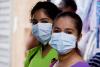 Two women wearing masks during Covid-19 pandemic