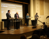 Panelists talking during the debate.