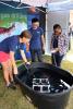 Emily Davenport - UGA, ECOGIG demonstrate remotely operated underwater vehicle at ECOGIG Exhibit.