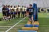 Students Run Drills at International Football Clinic