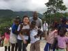 Jiaqing Li and Patrick Pierre hang with the Thoman locals.