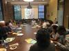 A photo of international students in the Ivan Allen College of Liberal Arts having a roundtable discussion with Dean Jacqueline Royster, school chairs, and other faculty and staff. 