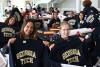 students holding Georgia Tech sweatshirts